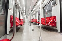 Free empty metro train coach interior with red seats photo, public domain CC0 image.