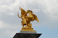 The reputation of science Alexandre III bridge statue, Paris. Free public domain CC0 photo.