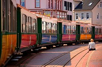 Train travelling on a track. Free public domain CC0 photo.