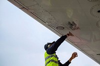 Free person fixing roof, public domain CC0 image.