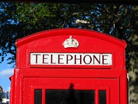 Iconic red phone booth in London, England. Free public domain CC0 photo.