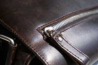 Leather briefcase closeup. Free public domain CC0 photo.