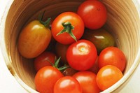 Tomatoes in wooden bowl, vegetable. Free public domain CC0 photo.