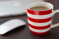 Free coffee break, office table, red mug photo, public domain beverage CC0 image.