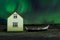 Free Norwegian house under aurora borealis, public domain shelter CC0 photo. 