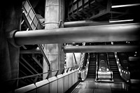 Free escalator in subway, black and white photo, public domain CC0 image.