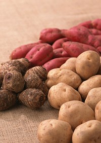Free potatoes, taro, sweet potatoes photo on beige bag photo, public domain vegetables CC0 image..