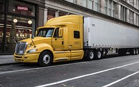 Free yellow truck on street image, public domain car CC0 photo.