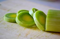 Free sliced leek close up on cutting board photo, public domain yyy CC0 image.