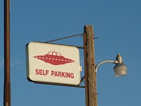 Free UFO self parking sign image, public domain CC0 photo.