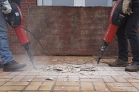 Free workers using drills on floor photo, public domain eqiupment CC0 image.