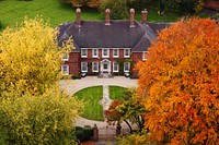 House between autumn trees, free public domain CC0 photo