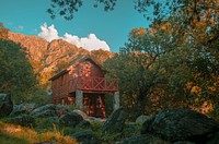 Free red cabin in forest image, public domain nature CC0 photo.