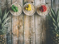 Free colorful cactus and pineapples on wooden table photo, public domain food CC0 image.