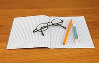 Notebook and pens. Free public domain CC0 photo.