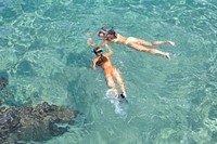 Free clear ocean water with people swimming photo, public domain nature CC0 image.