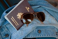 Passport and sunglasses, free public domain CC0 image.