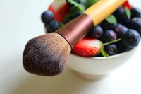 Berries and powder brush. Free public domain CC0 photo.