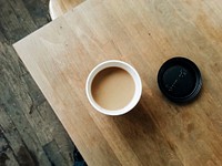 Free coffee cup on wooden table photo, public domain beverage CC0 image.
