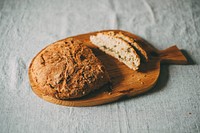 Free fresh slide bread on wooden cutting board image. public domain food CC0 photo.