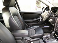 Car interior, steering wheel photo, free public domain CC0 image.