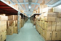 Products being kept in boxes in a warehouse. Free public domain CC0 photo.