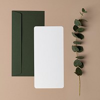 White blank card, green envelope, botanical design