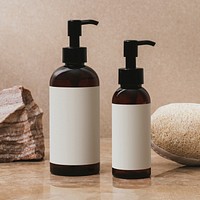 Blank white label on brown pump bottles, beauty product packaging design