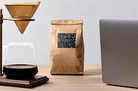 Coffee lover workspace, drip coffee by a laptop