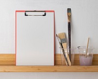 Blank paper on clipboard, artist workspace