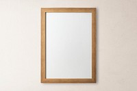 Blank wooden frame, beige wall