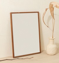 Blank photo frame, clean beige home interior decor