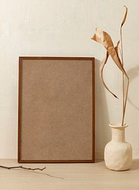 Blank photo frame, clean beige home interior decor