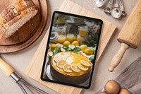 Tablet screen, food blogger lifestyle with dessert photo on screen