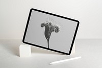 Tablet with gray plant screen