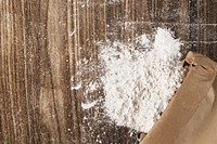 Flour texture, wooden background, baking concept