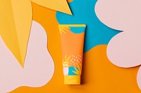 Orange sunscreen tube, tropical beauty product packaging design