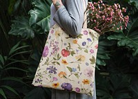 Woman carrying flower tote bag, floral pattern design, remix from the artworks of Pierre Joseph Redouté