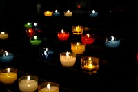 Free lit candles on water image, public domain CC0 photo.