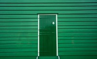 Green door of a wooden house photo, free public domain CC0 image.