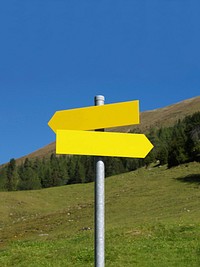 Free yellow signpost in the mountains image, public domain CC0 photo.