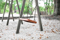 Swing in playground. Free public domain CC0 image.