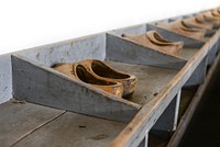 Free school clogs on wooden rack photo, public domain CC0 image.