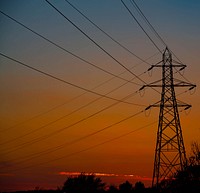 Free electricity pylon against a spring sunset, public domain CC0 photo.