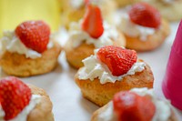 Free strawberry cream on mini bun image, public domain dessert CC0 photo.