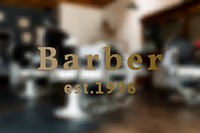 Gold barber shop sign on a glass wall, small business design