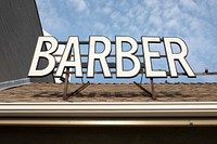 Barber shop sign on roof, business identity branding