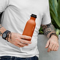 Tattooed man with orange insulated water bottle