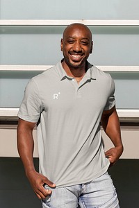 Happy African American man, wearing a polo shirt