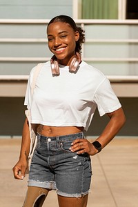 Confident amputee woman wearing white plain shirt, happy summer image 